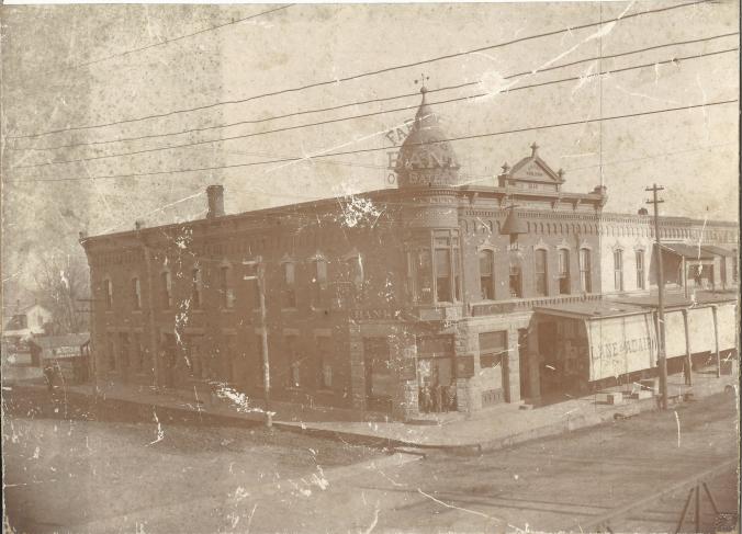 The Farmers Bank on the east side of the Butler Square.  It was built in 1888 and torn down in 1919.  The Catterlin house can be seen on the left of the bank.  Security Bank is presently in this location.