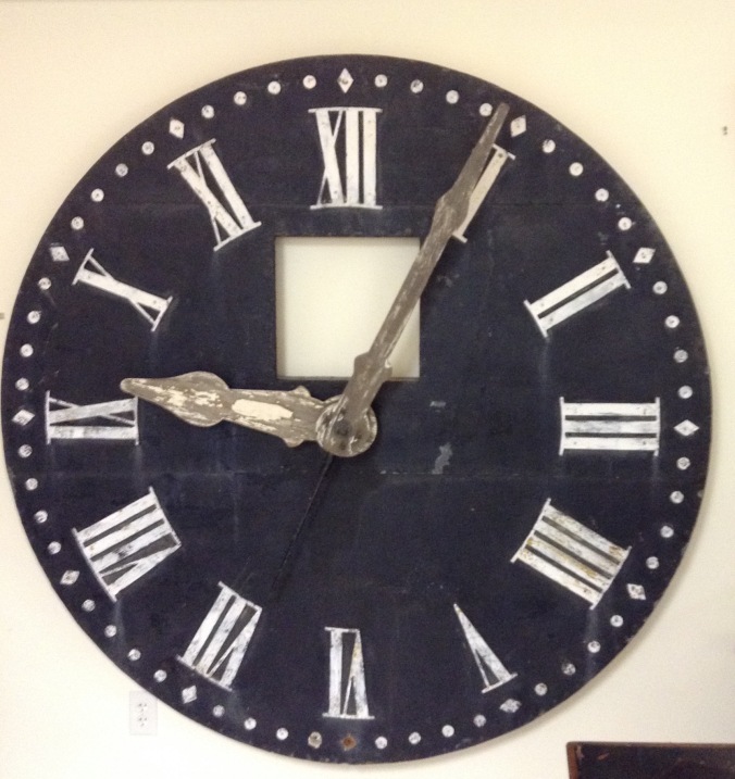 One of the original clock faces from the Courthouse. On display at the Bates County Museum.